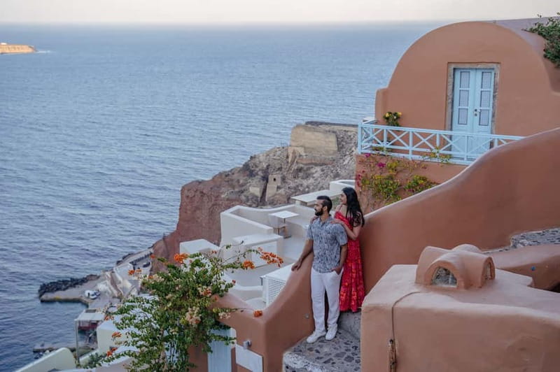Oia: Couple Photoshoot Seprate Entrance to Blue Dome - Why a Santorini photoshoot can be worth the cost