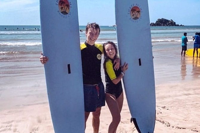 PRIVATE Surf lesson for Beginners Couple - Entering Weligama Beach for your first waves